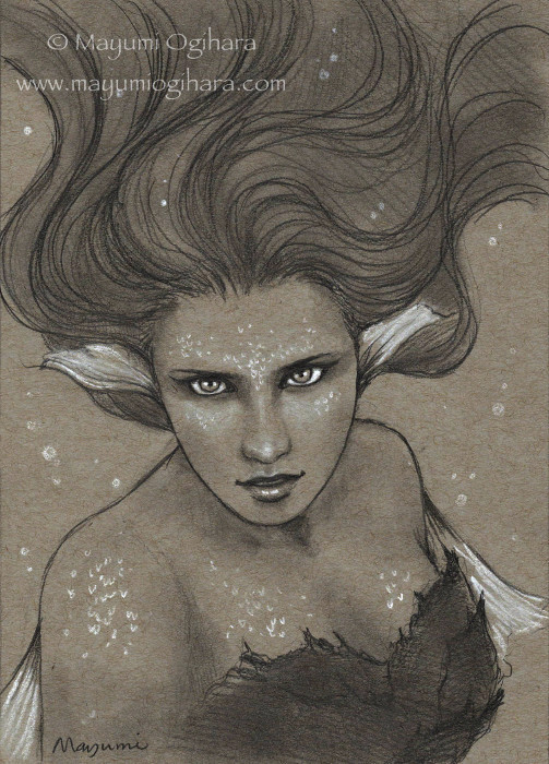A mermaid stares straight ahead at the viewer, her dark tresses touched with white floating above her head. Faint scales shimmer on her chest and shoulders, while her breasts are covered with clinging kelp-like material. She appears to have fins on the backs of her upper arms. Figure is shown from the torso up with arms mostly off page. Drawn with graphite and white charcoal on greyish beige toned paper.